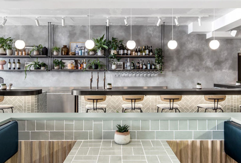 Gorgeous restaurant with concrete walls and wood elements from London ...